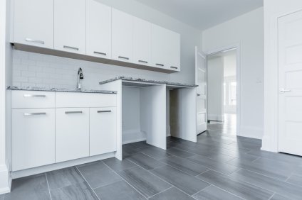 Contemporary Laundry Room Floor and Backsplash